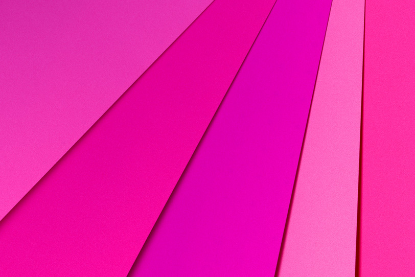 鮮やかなピンク系の背景の写真画像