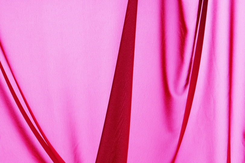 ピンクの布の背景素材の写真画像