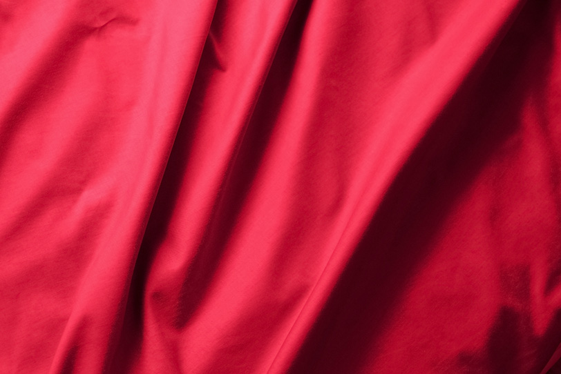 赤色の布のバックグラウンドの写真画像