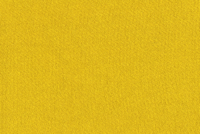 黄色い伸縮性のある布の写真画像