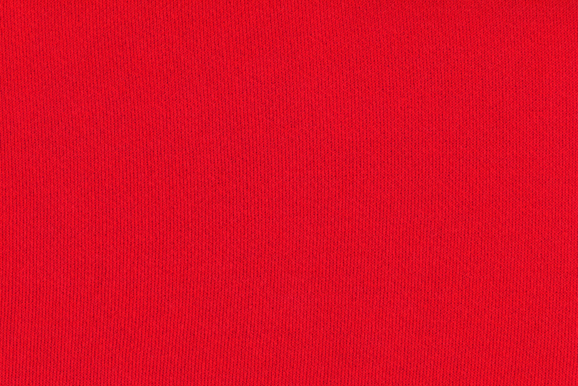 赤いスウェット生地のテクスチャの写真画像
