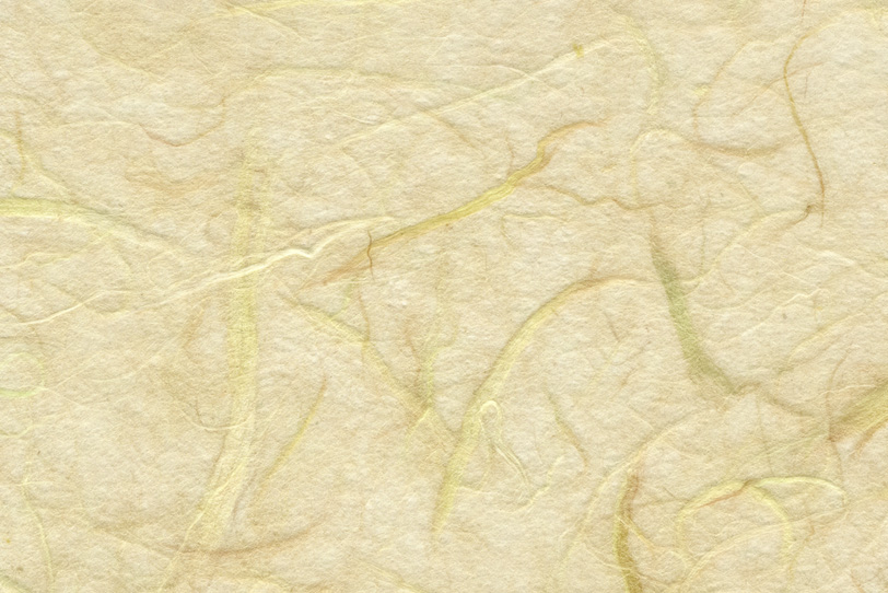 粗い筋の入った淡黄蘗色の和紙の写真画像