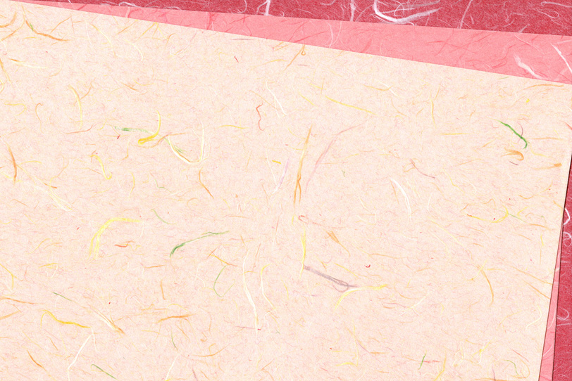 春らしいピンク系の和紙背景の写真画像
