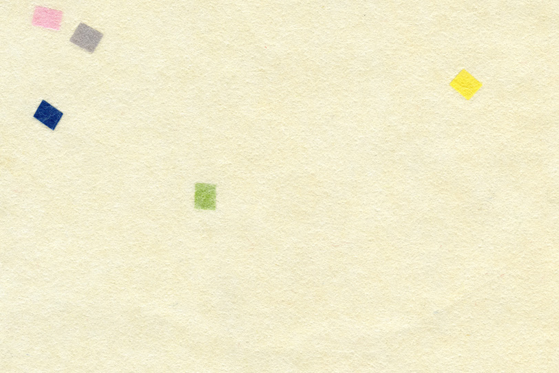 淡黄蘗色の紙に四角い色模様入の和紙の写真画像