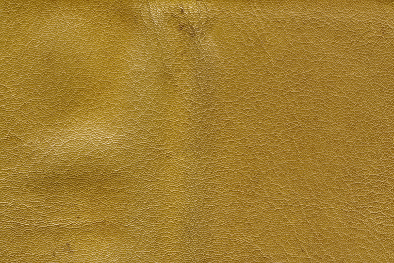 黄色に染められた革のテクスチャの写真画像