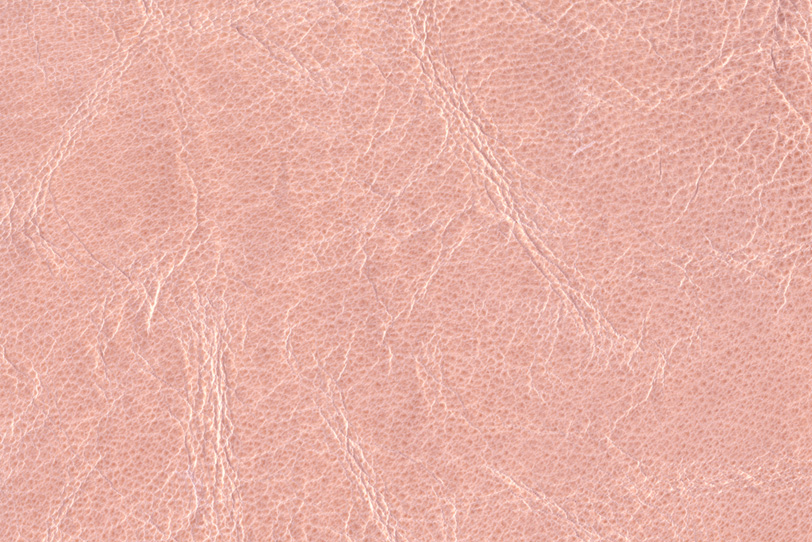 シワの入ったピンクの革の写真画像
