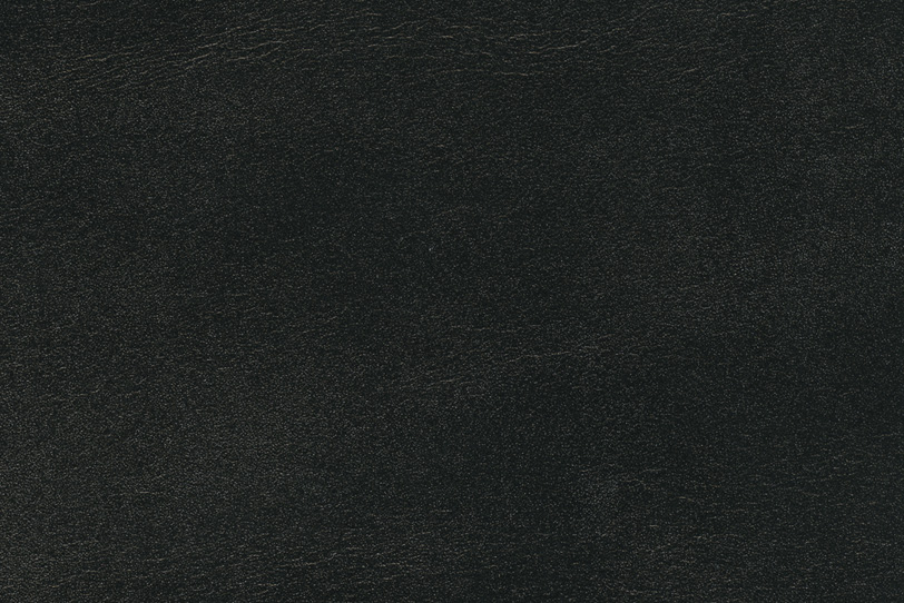 黒くシワのある革の写真画像
