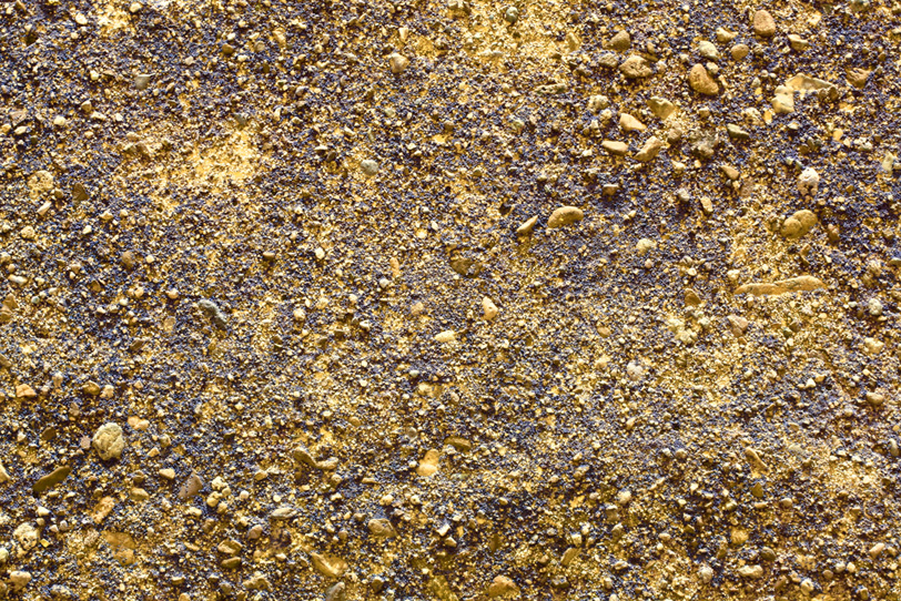 ゴールドの砂利のようなテクスチャの写真画像