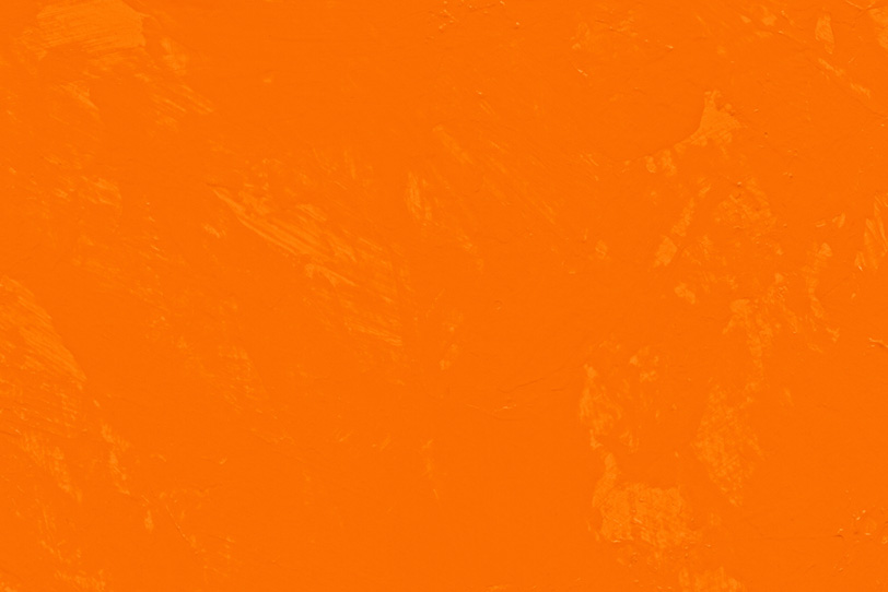 オレンジの無地のテクスチャ壁紙