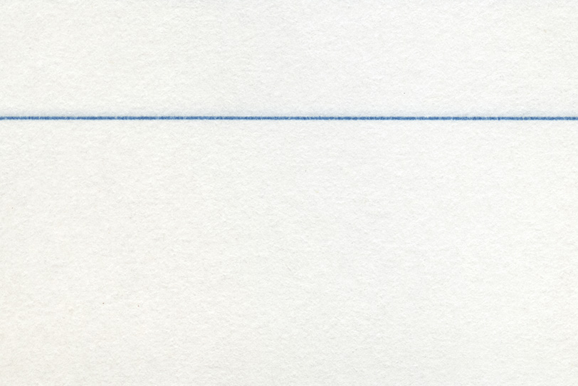 青い罫線のある紙のノートの写真画像