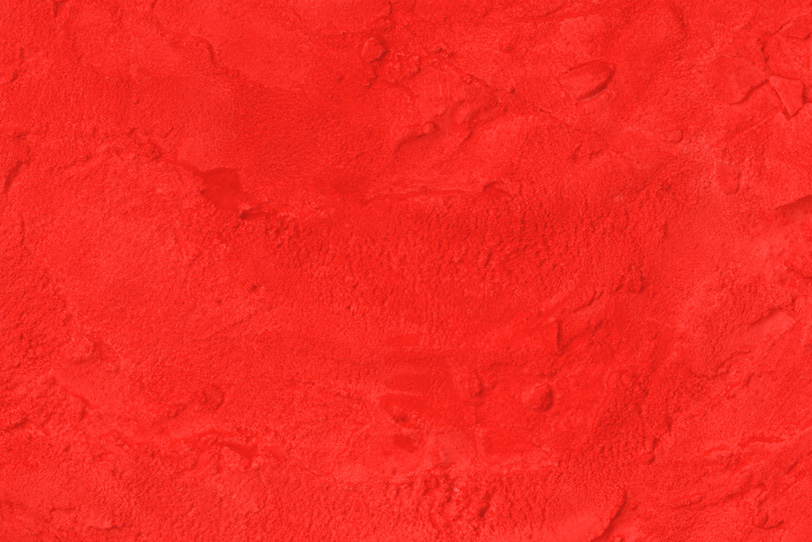 シンプルな赤色のテクスチャ背景
