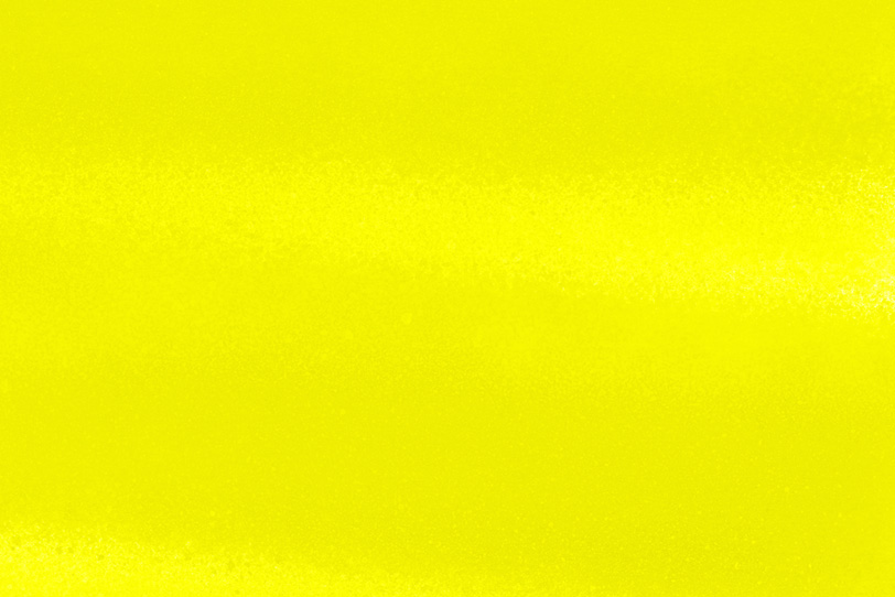 黄色を塗装したシンプルな壁紙