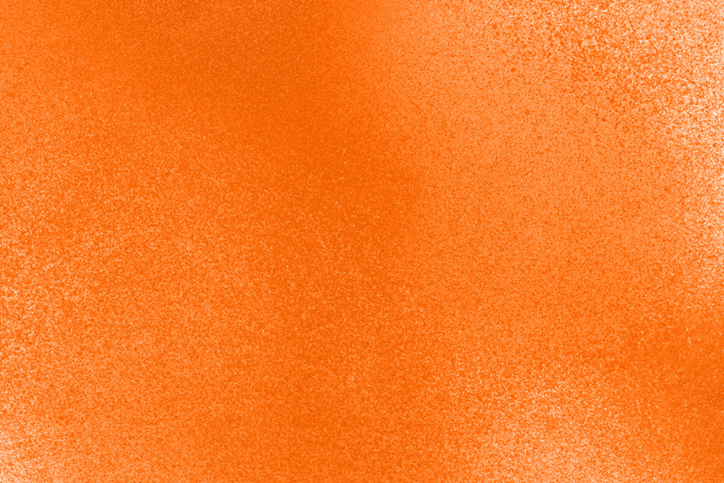 オレンジ色のスプレーテクスチャ素材