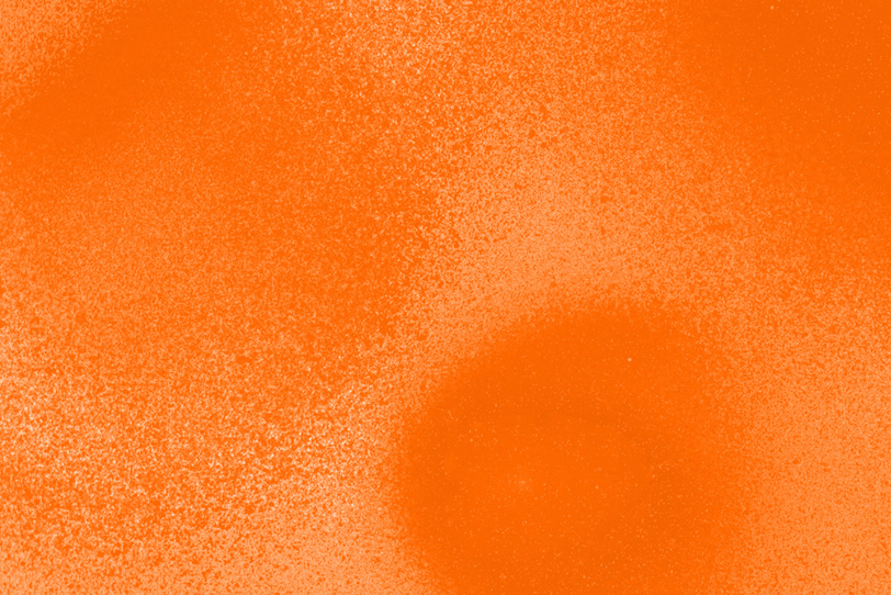 シンプルなオレンジのカラースプレー背景