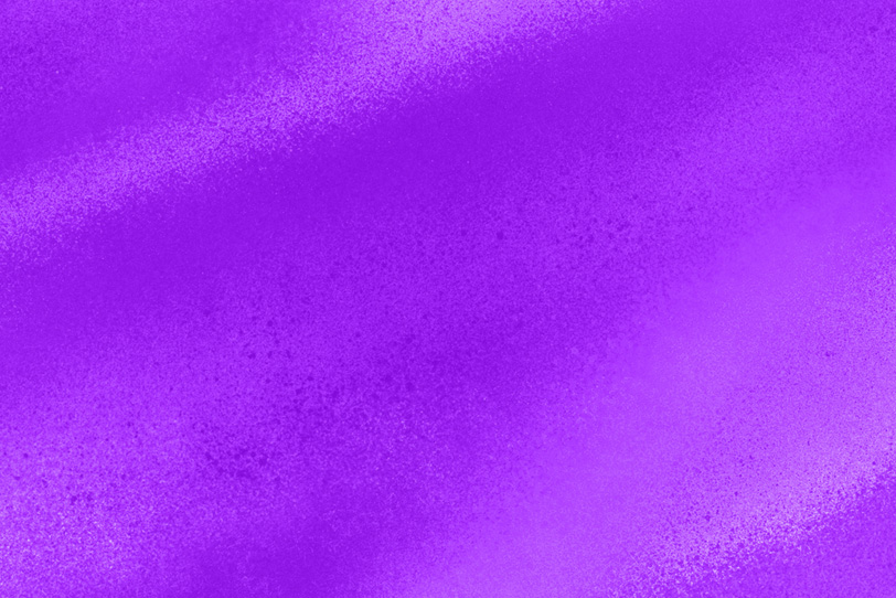 紫をスプレーしたシンプルな背景