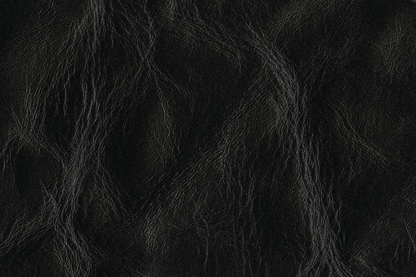 重厚感のある黒い皮革のテクスチャの写真画像