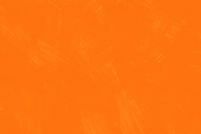 筆跡の残るオレンジ色の背景壁紙