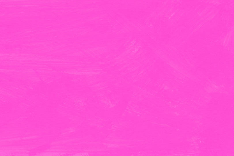 ピンク色を塗装したシンプル背景