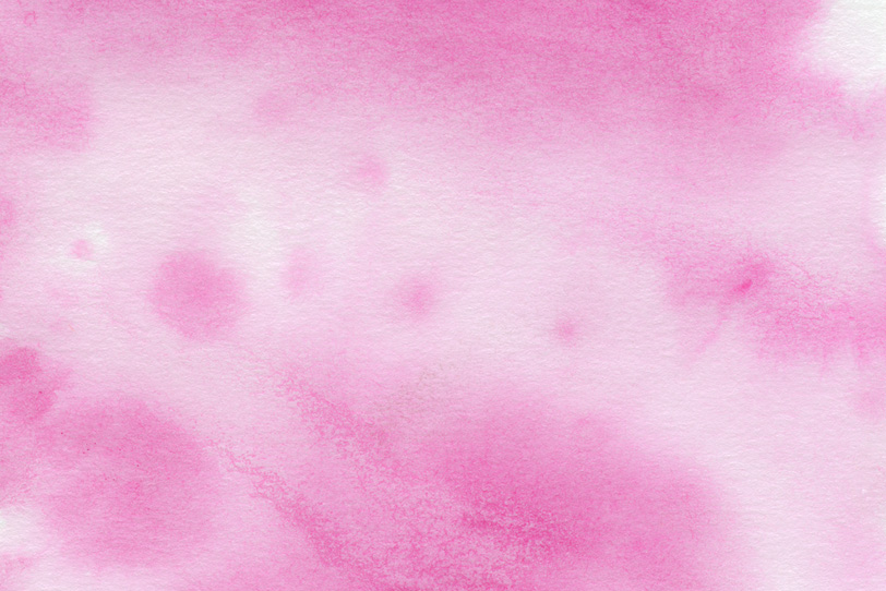 ピンクの水彩が滲むテクスチャの写真画像