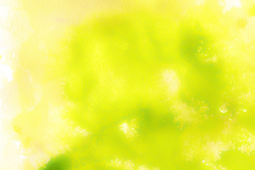 黄色と緑の水彩が混ざり合うの写真画像