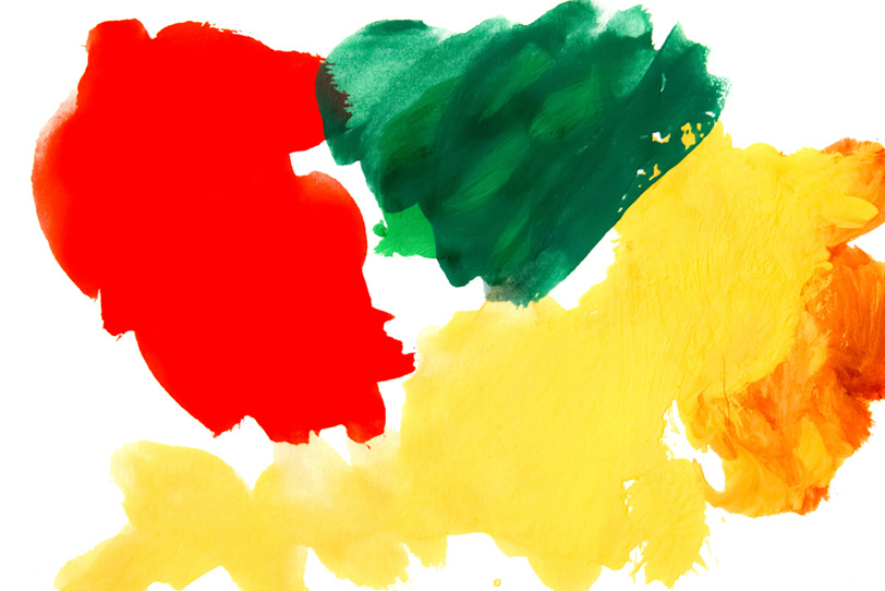白背景と赤緑黄の水彩絵の具の写真画像