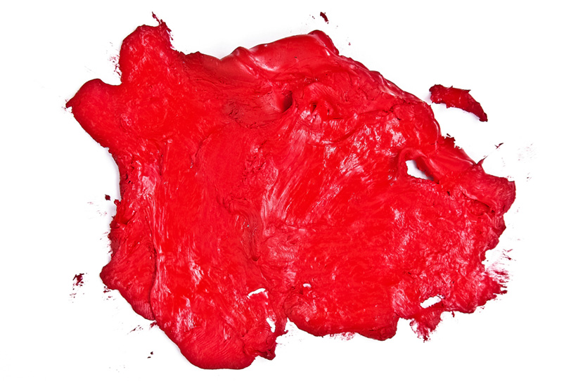 赤い水彩絵具のテクスチャの写真画像
