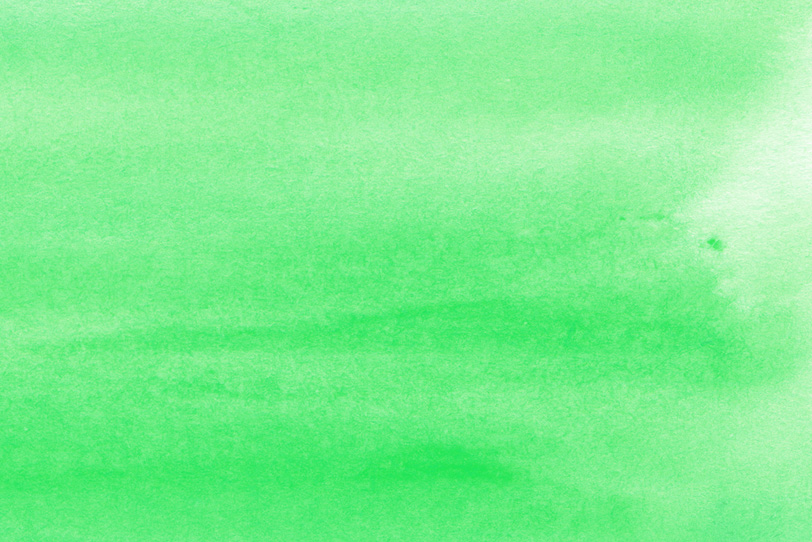 淡いサマーグリーンの水彩絵具の写真画像