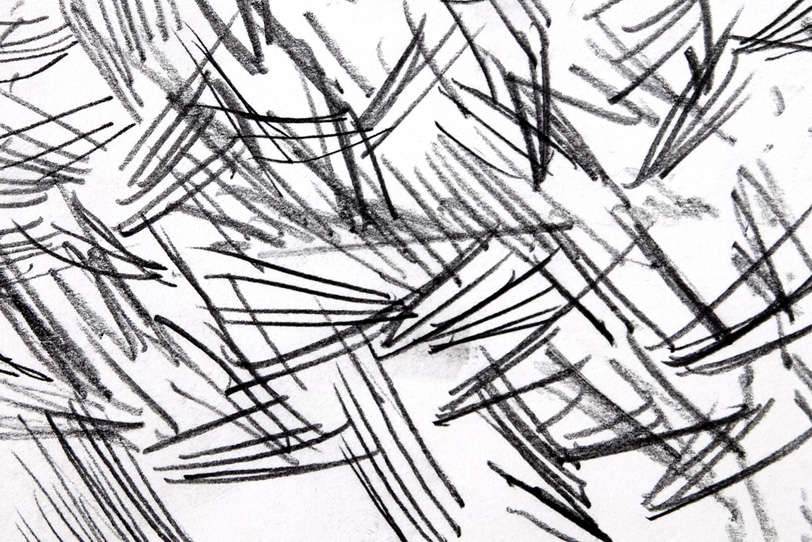 鉛筆で描いた短い直線の集合の写真画像