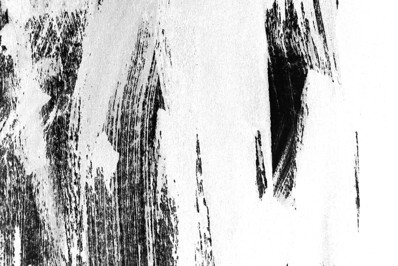 白黒の掠れた筆塗りのテクスチャの写真画像