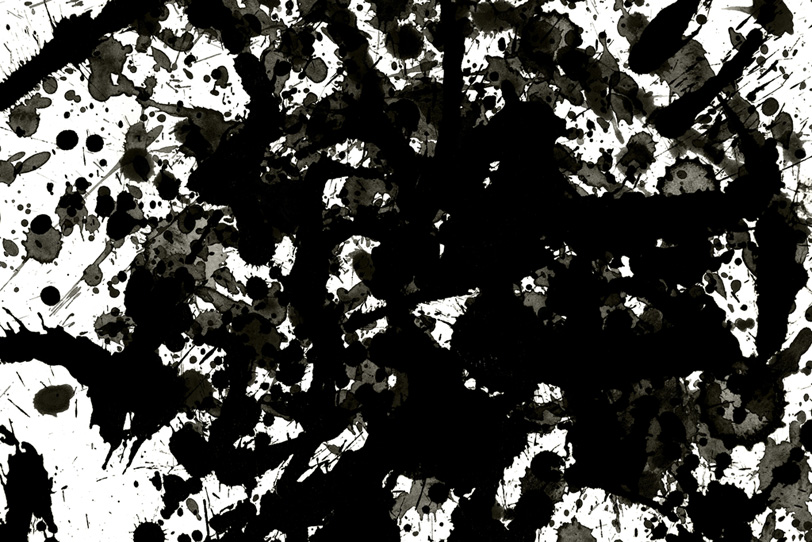 全面を覆う黒いスプラッターの写真画像