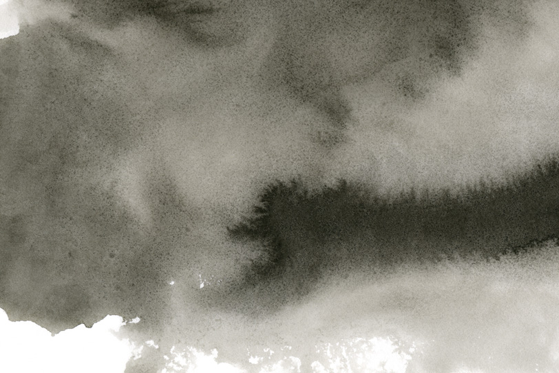 暗雲のような水に滲む黒い墨の写真画像