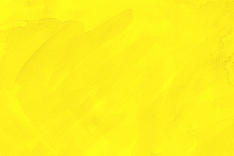 黄色の水彩できれいな背景