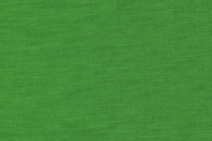 緑色に染められた綿の布（テクスチャ 素材の背景フリー画像）