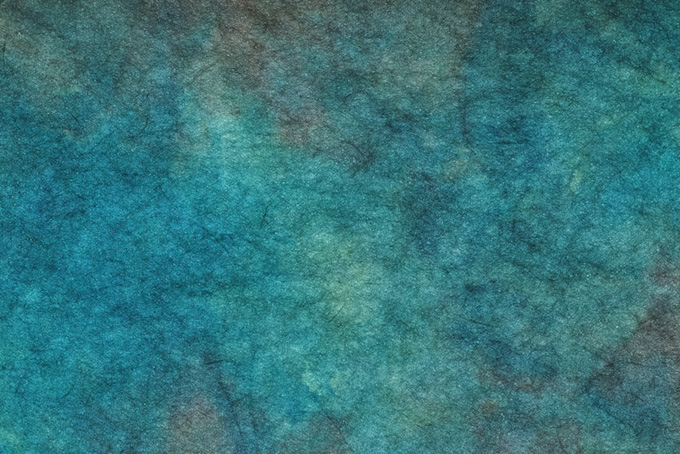 斑のある孔雀青の絞り染め和紙（カラフル 和紙 おしゃれの背景フリー画像）