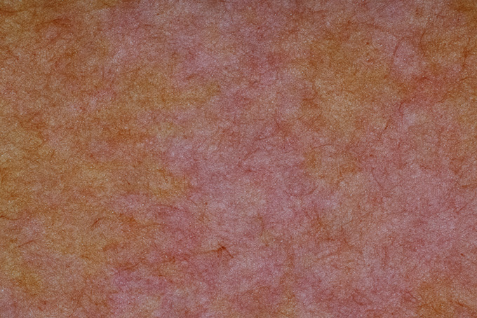 薄い赤色と黄色が混ざった色染め和紙（和紙 ぼかしの背景フリー画像）