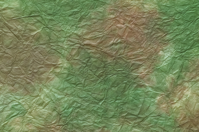 緑青色に茶色の斑のある揉染和紙（和紙 にじみの背景フリー画像）