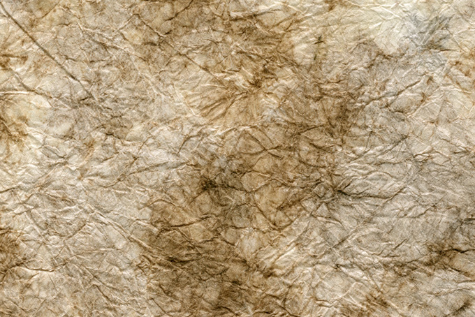 茶染模様ある白橡色の揉染和紙（和紙 にじみの背景フリー画像）