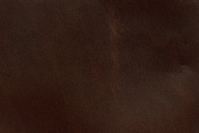 古い赤茶色のコードバン素材（皮 革の背景フリー画像）