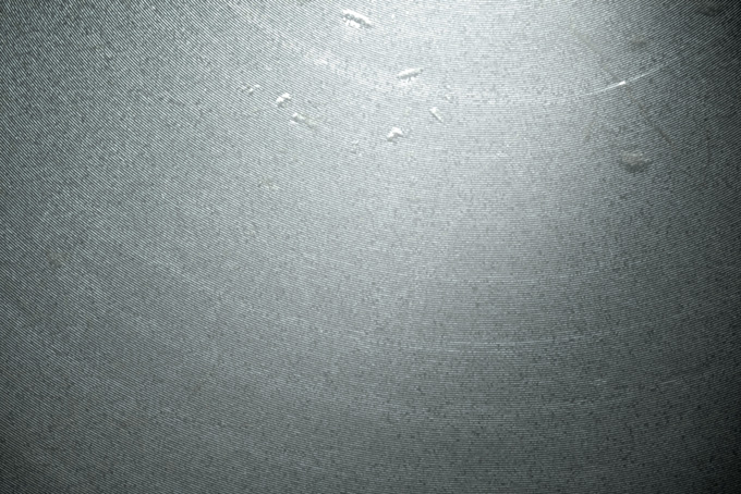 波紋のような質感の金属素材(背景 金属 画像のフリー画像)