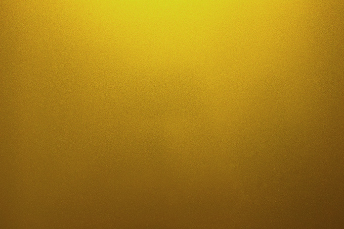 光を反射する金色の金属素材（金属 素材の背景フリー画像）