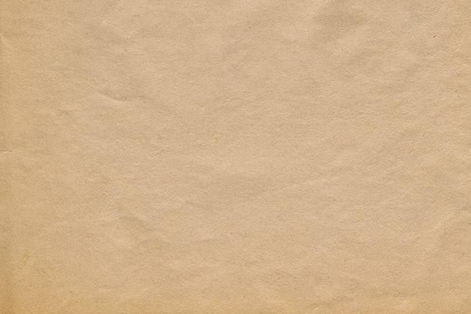 ザラザラとした茶色いクラフト紙（紙 素材の背景フリー画像）