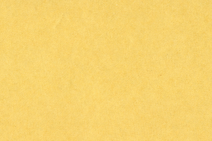 薄黄色のクラフト紙（テクスチャ 素材の背景フリー画像）