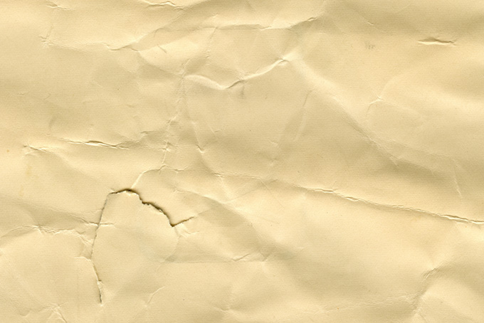 傷ついた茶色い紙のテクスチャ（紙 素材の背景フリー画像）