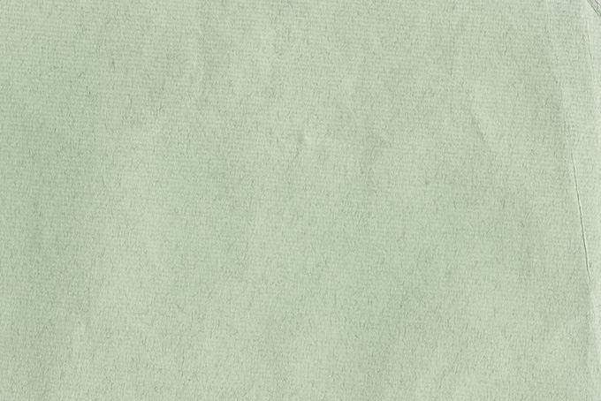 繊維のテクスチャがある薄緑の紙の素材（紙 無地の背景フリー画像）