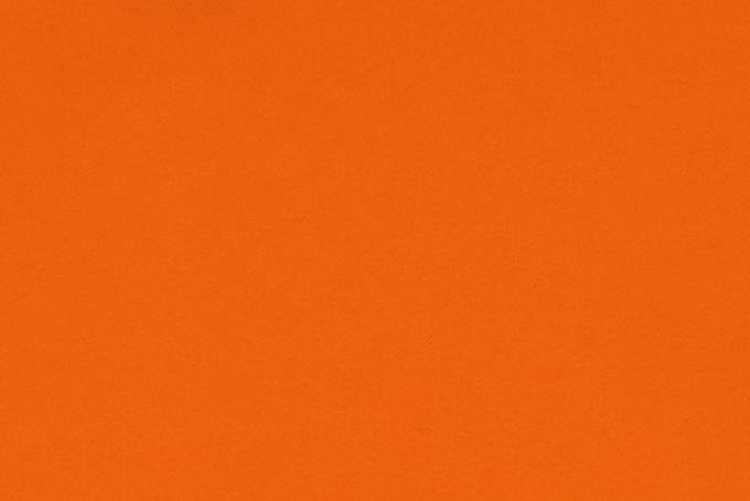 オレンジ色の綺麗な壁紙画像（無地 テクスチャの背景フリー画像）