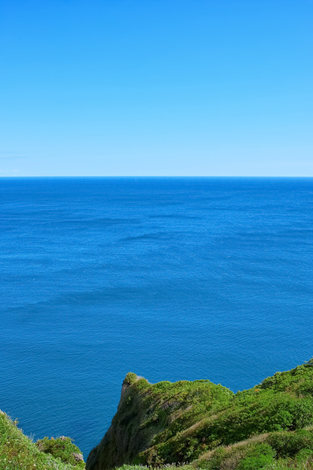 水平線と岬の写真（背景 画像 海の背景フリー画像）