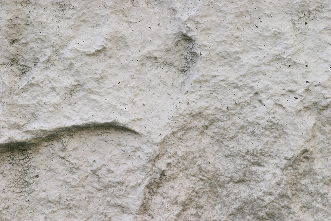 ザラザラとした白い岩（テクスチャ 素材の背景フリー画像）