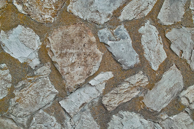 色々な石をはめ込んだ壁面（背景 画像 石壁の背景フリー画像）