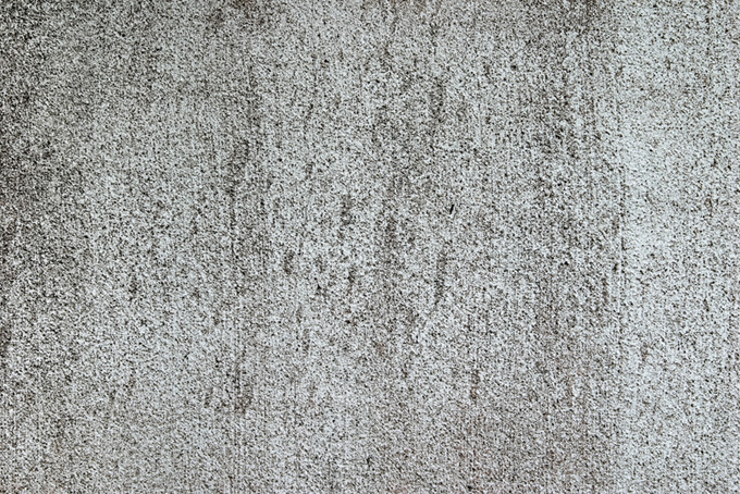 塗り跡のあるモルタル壁（コンクリート テクスチャ 壁紙の背景フリー画像）