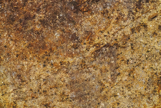 薄茶色の岩（岩 素材の背景フリー画像）